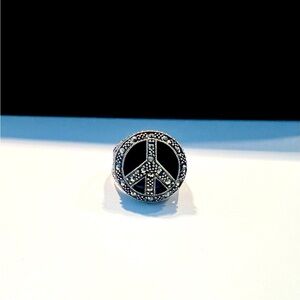 Sterling silver, Marcasite and Onyx Peace ring.￼